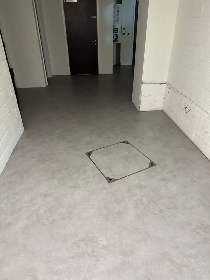 Flooring fitted around an inset access panel